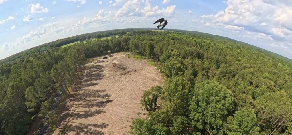Aerial view of America’s Campus for the Next Generation, the 82-acre Children of Fallen Heroes property in Vass, North Carolina, with cleared land surrounded by pine forest