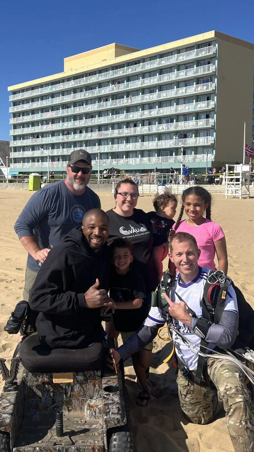 Jump for a Purpose participants and families on the beach at Virginia Beach
