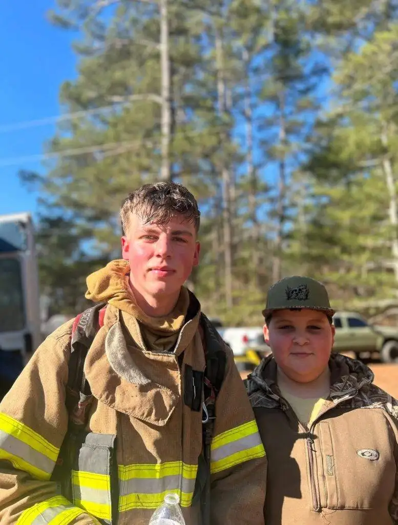 Whitaker’s sons — one serving as a firefighter, the other an avid outdoorsman and archer