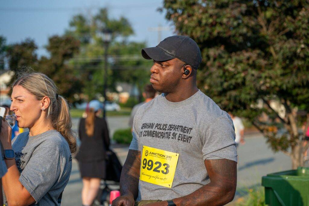 Community members at the 25th Anniversary 9/11 Commemorative 5K in Graham, North Carolina.