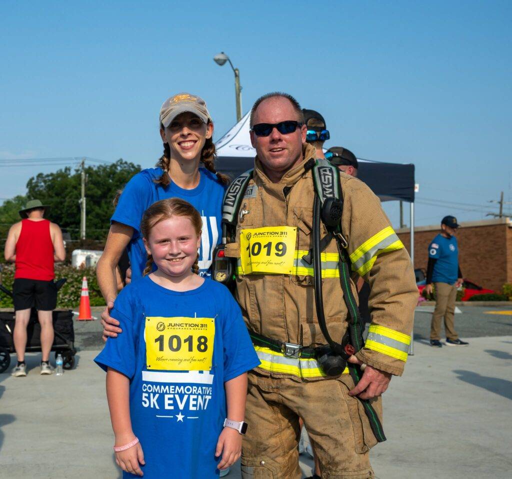 Community members at the 25th Anniversary 9/11 Commemorative 5K in Graham, North Carolina.