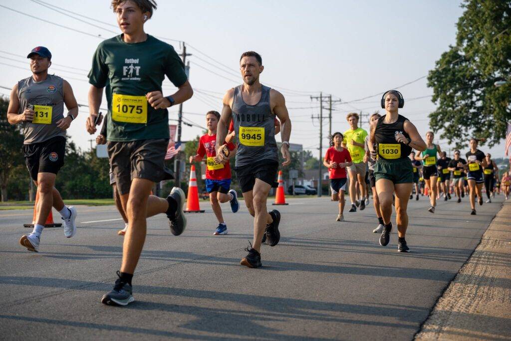 Community members at the 25th Anniversary 9/11 Commemorative 5K in Graham, North Carolina.