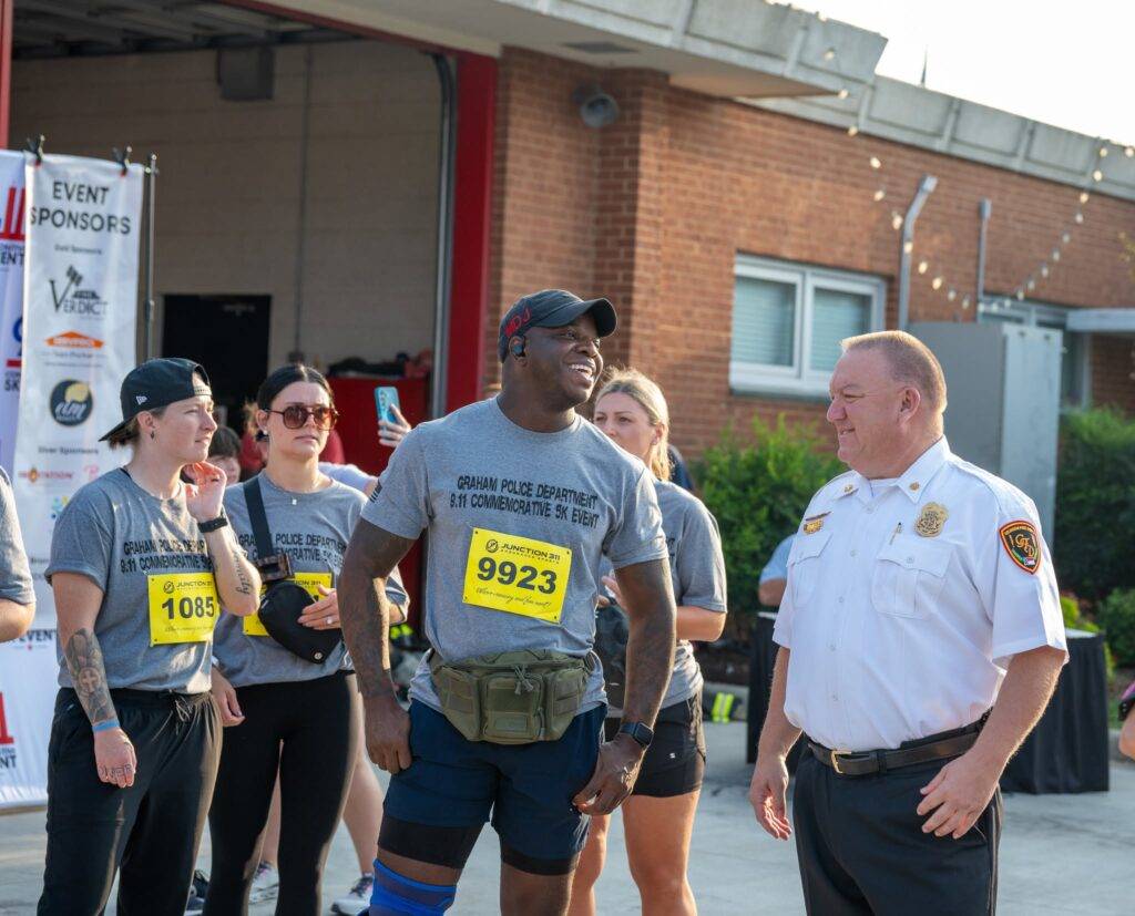 Community members at the 25th Anniversary 9/11 Commemorative 5K in Graham, North Carolina.