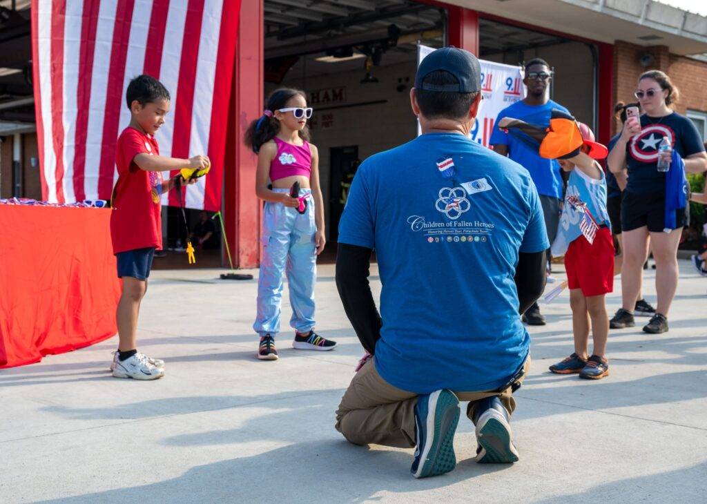 Community members at the 25th Anniversary 9/11 Commemorative 5K in Graham, North Carolina.