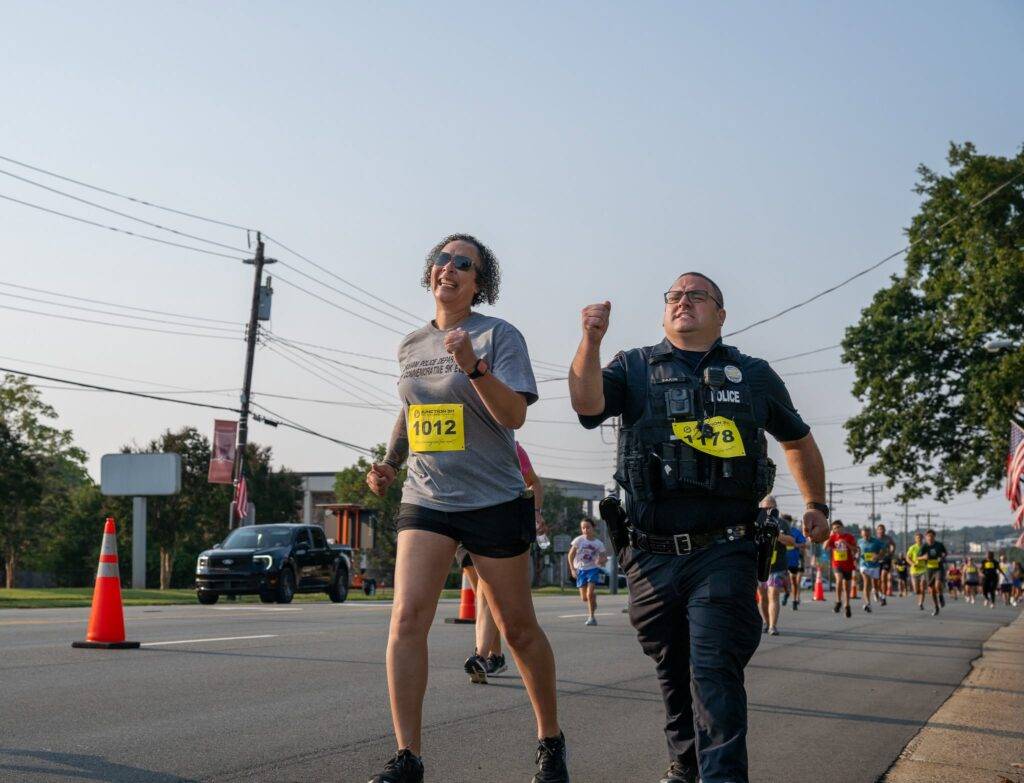Community members at the 25th Anniversary 9/11 Commemorative 5K in Graham, North Carolina.
