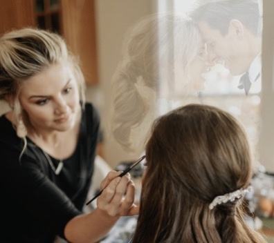Kayla applying makeup
