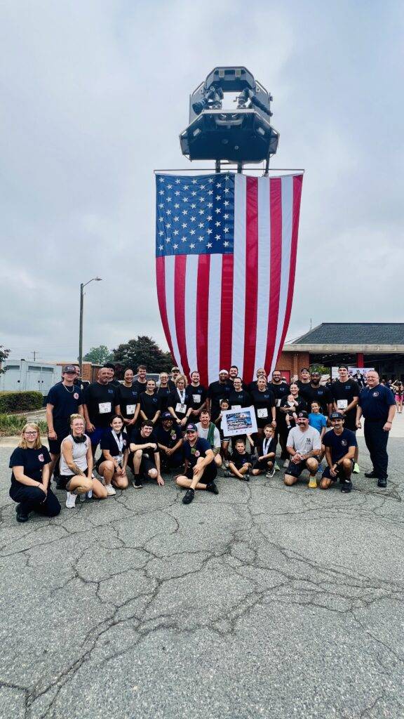 Community members at the 25th Anniversary 9/11 Commemorative 5K in Graham, North Carolina.