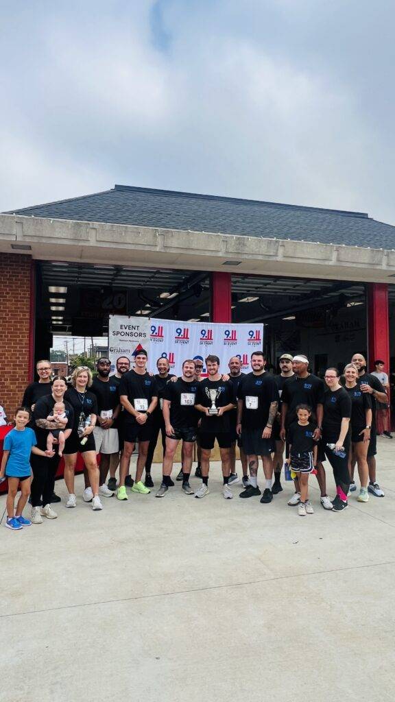 Community members at the 25th Anniversary 9/11 Commemorative 5K in Graham, North Carolina.