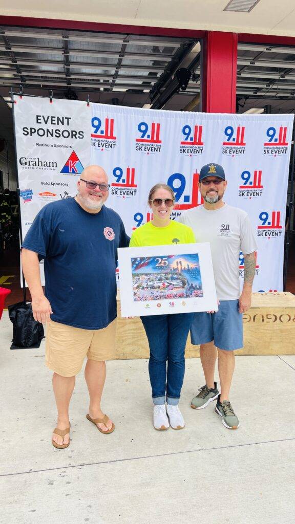 Community members at the 25th Anniversary 9/11 Commemorative 5K in Graham, North Carolina.