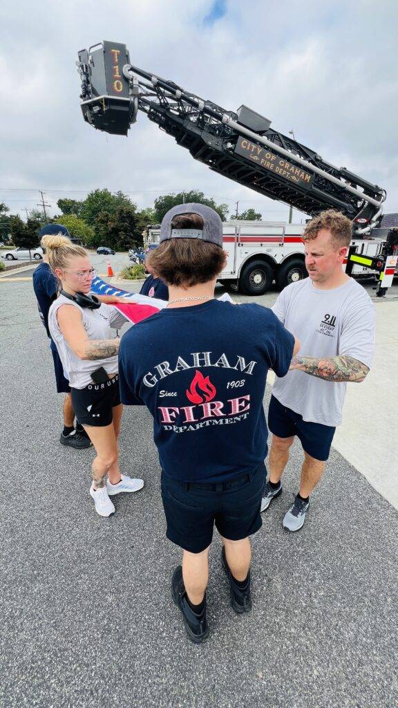 Community members at the 25th Anniversary 9/11 Commemorative 5K in Graham, North Carolina.