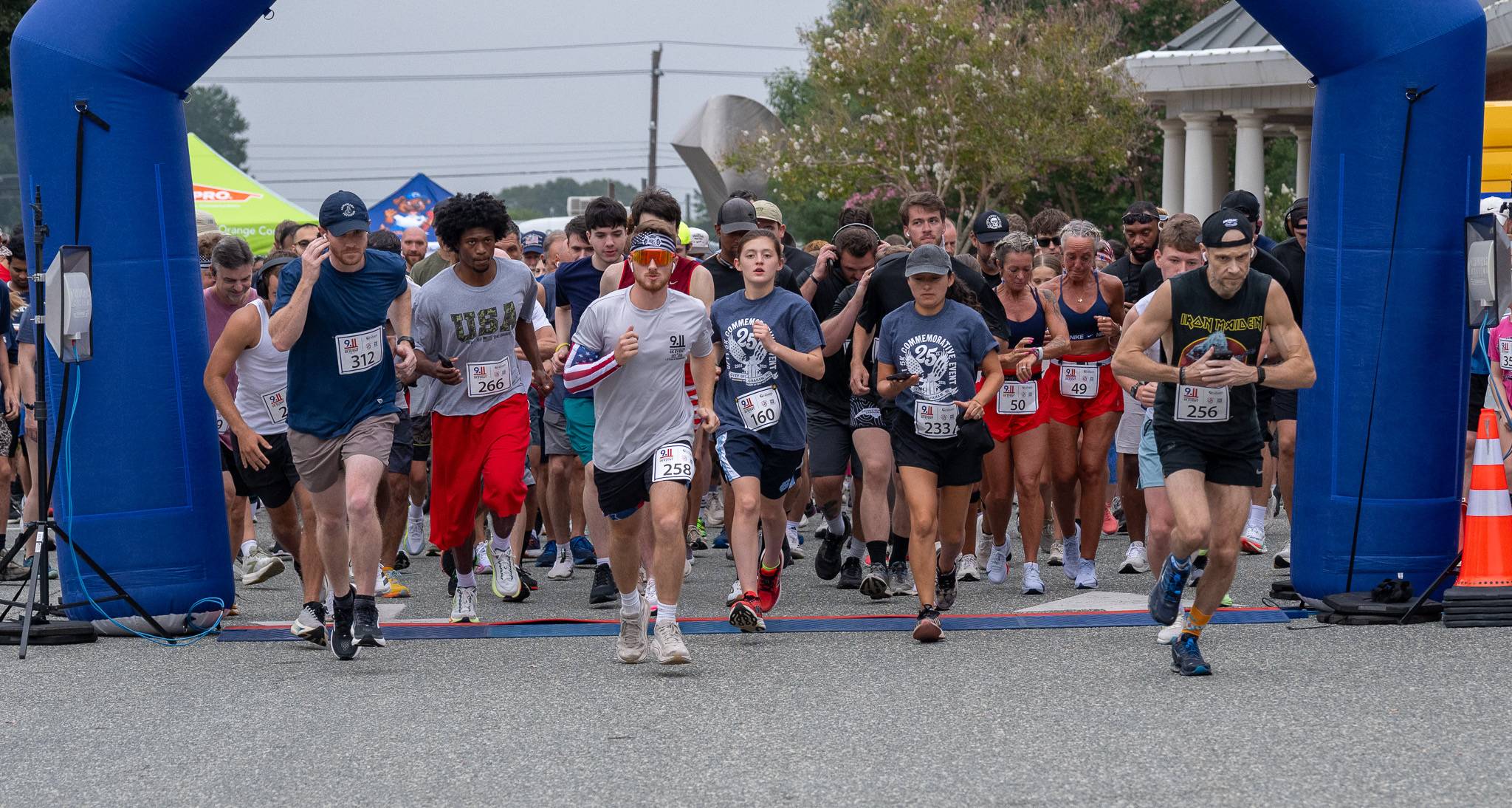 Community members at the 25th Anniversary 9/11 Commemorative 5K in Graham, North Carolina.