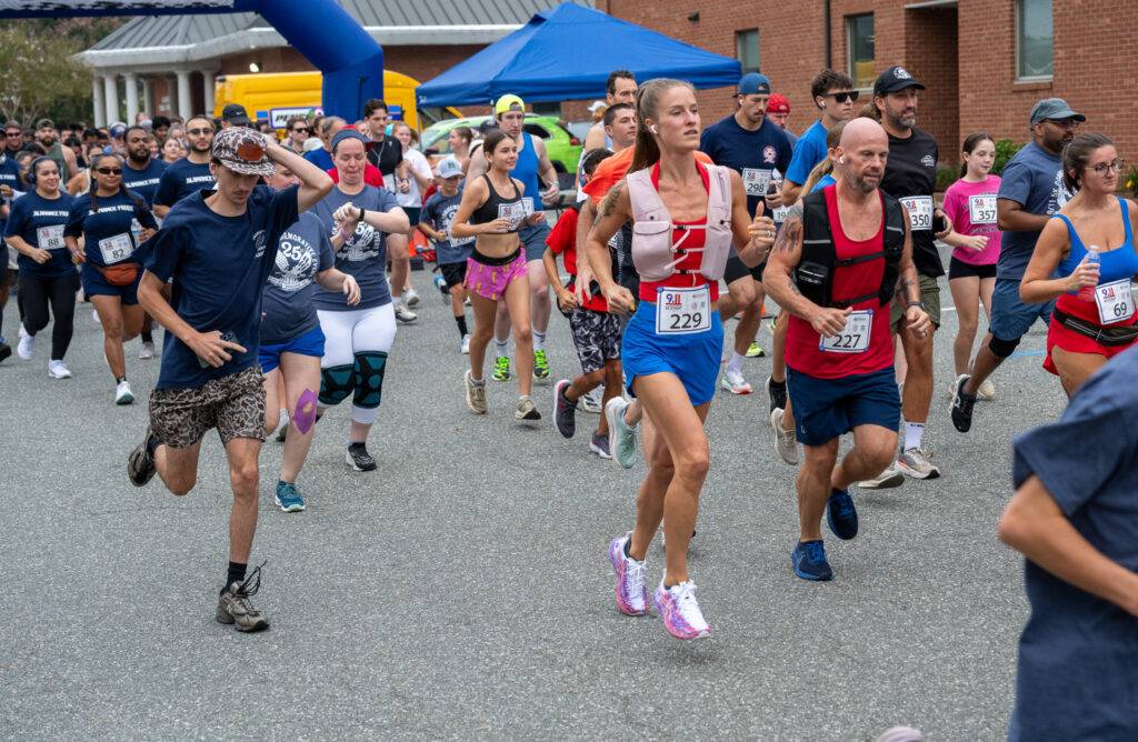 Community members at the 25th Anniversary 9/11 Commemorative 5K in Graham, North Carolina.