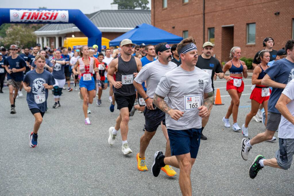 Community members at the 25th Anniversary 9/11 Commemorative 5K in Graham, North Carolina.