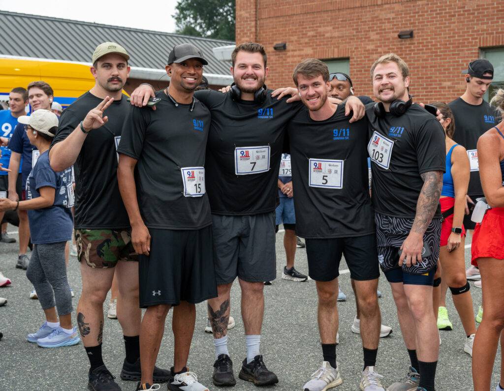 Community members at the 25th Anniversary 9/11 Commemorative 5K in Graham, North Carolina.