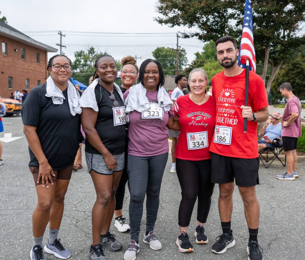 Community members at the 25th Anniversary 9/11 Commemorative 5K in Graham, North Carolina.