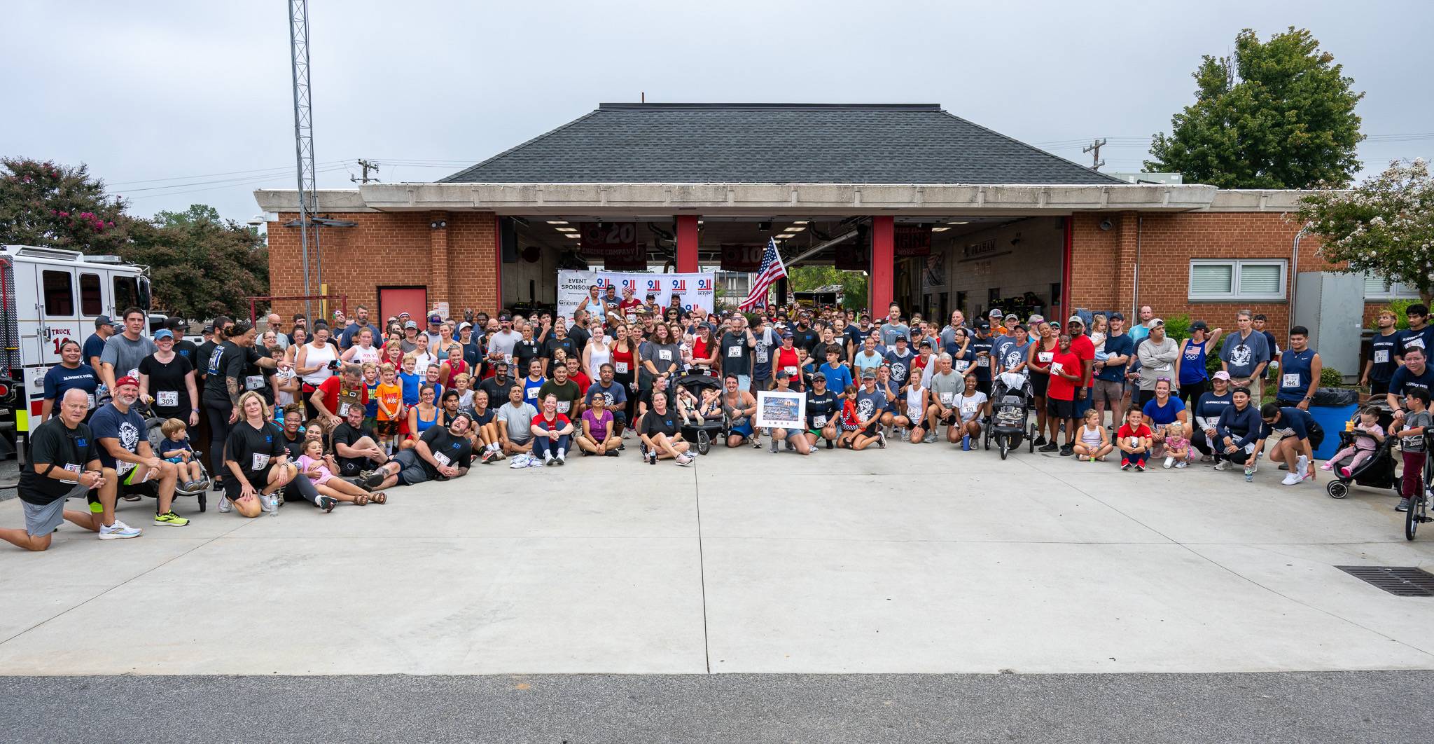 Community members at the 25th Anniversary 9/11 Commemorative 5K in Graham, North Carolina.